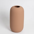 Brown ceramic vase on a white background