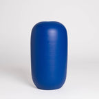 Blue cylindrical vase on a white background